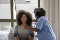 Nurse examining transgender woman